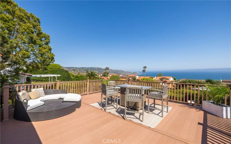 Private Spanish-tiled stairs lead down to the patio, enhancing the sense of exclusivity.