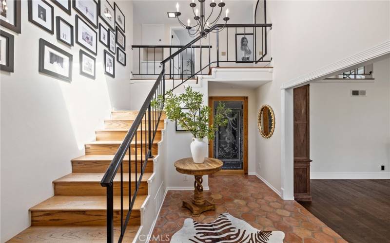 Dramatic foyer with a skylight that bathes the space in natural light.