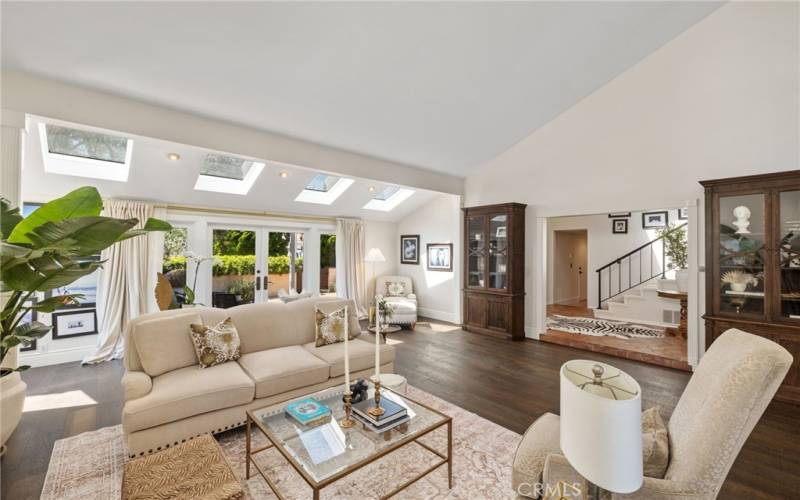 The formal living room overlooking and opens to the courtyard with French Doors.