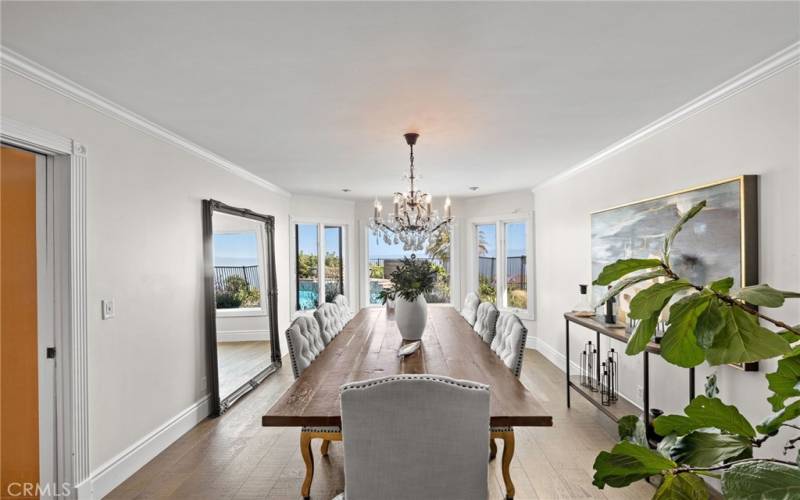 The formal dining room is a gorgeous setting with ocean views.