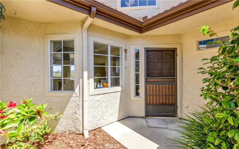 Gated courtyard entry.