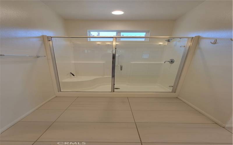 Walk-in closet in the primary bedroom