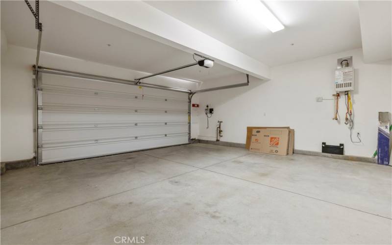 large 2 car garage with tankless water  heater