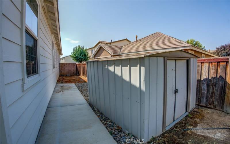 The other side of the house offers room for a storage shed.