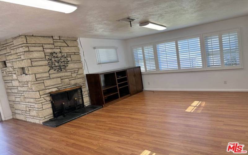 Family Room with sliding door to patio & backyard