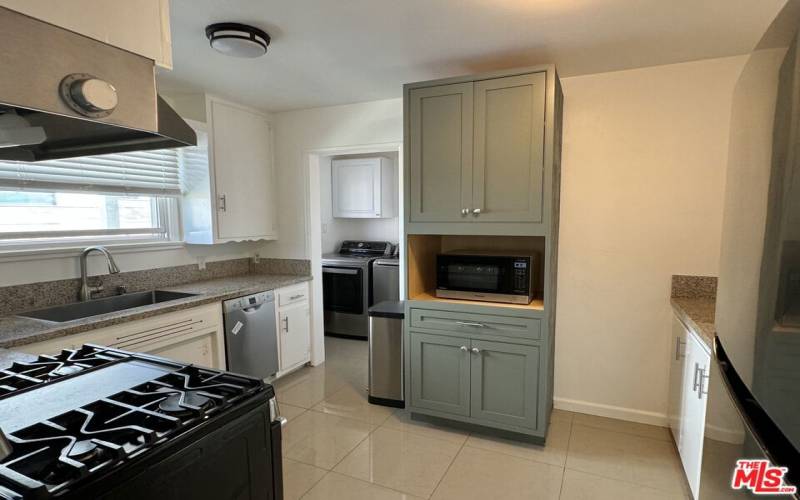 Kitchen with laundry room attached & side entrance