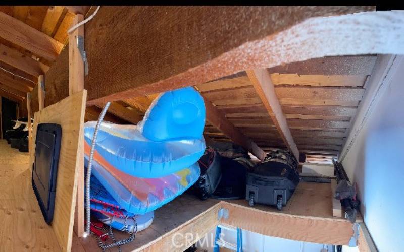 Right Side of the HUGE Attic above the 2 car garage... ANOTHER Area TO Store ALL YOUR STUFF!!!!