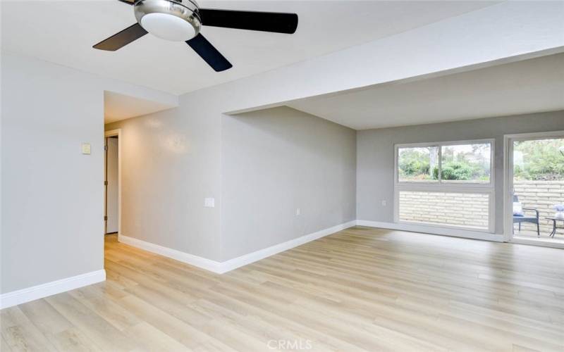 LIVING ROOM & CEILING FAN IN DINING AREA