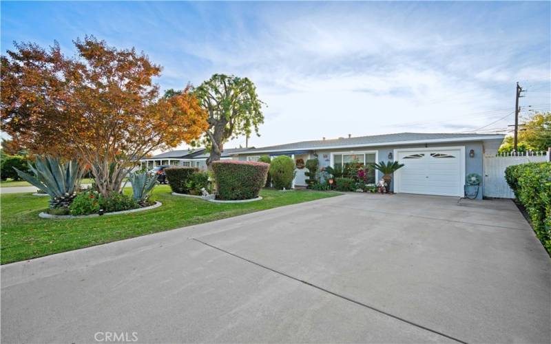 Total 5 Parking spots on the Driveway including a car garage.