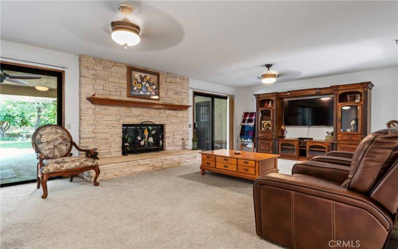 Family Room-Fireplace, Sliders Exit to Backyard Patio