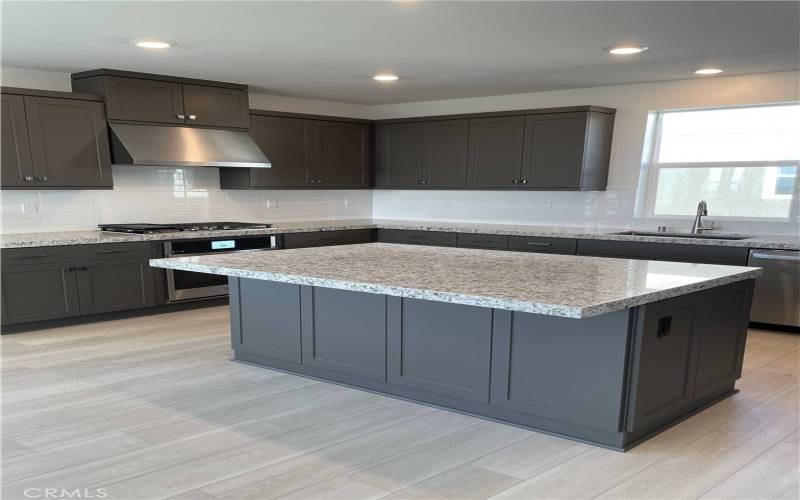 Large Open Kitchen with Stone Countertops. Perfect for entertaining