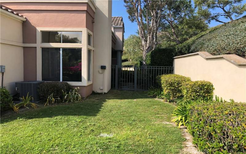 Side yard with gated entry