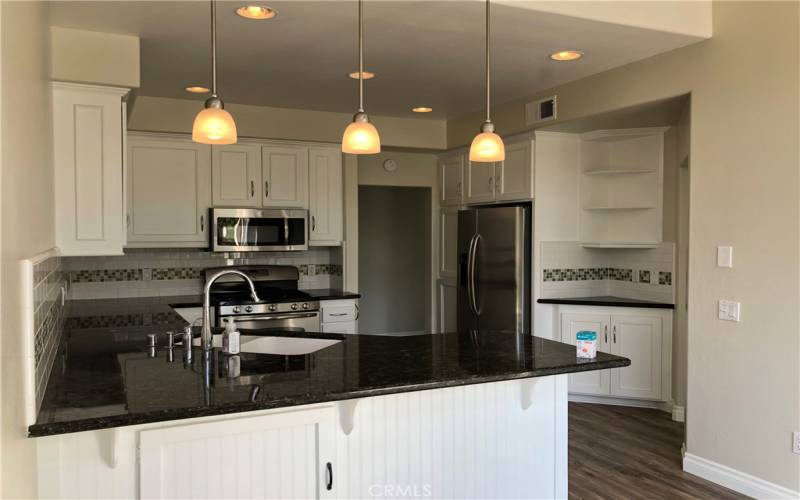 Light and bright kitchen area with breaknook.