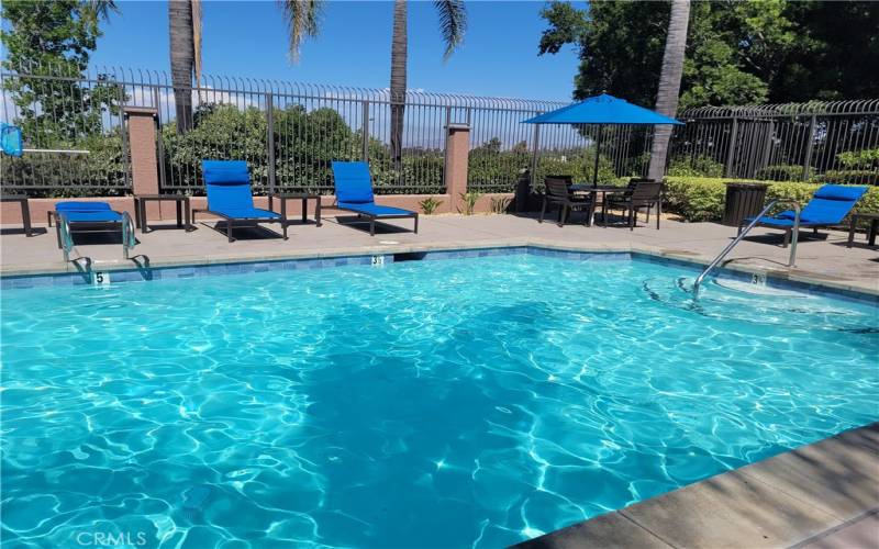 Beautiful pool with sitting areas