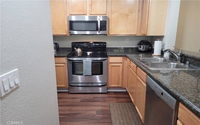 Another view of the large kitchen, dishwasher and plenty of storage