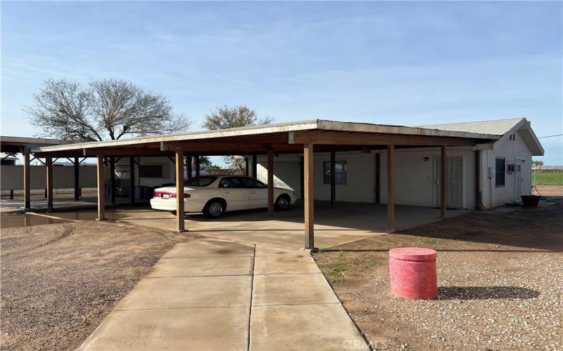 5 vehicle carport attached to guest house