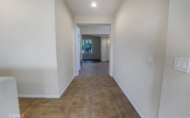 hallway linking great room and family room