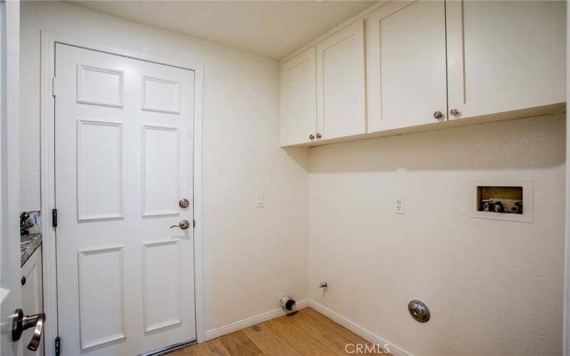 Utility room with cabinets