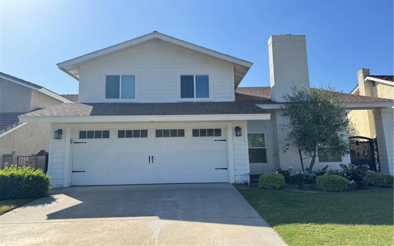 2 car garage with washer and dryer, and fridge