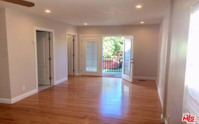 Primary suite with french doors to back yard