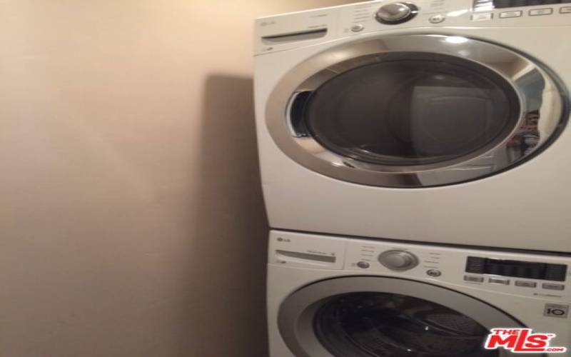 Laundry room with full size washer/dryer