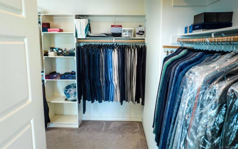 Wrap Around Walk-in Closet with Natural Lighting.