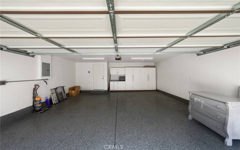 Attached 2-car garage with epoxy flooring