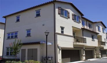 Side view showing the garage and the balcony