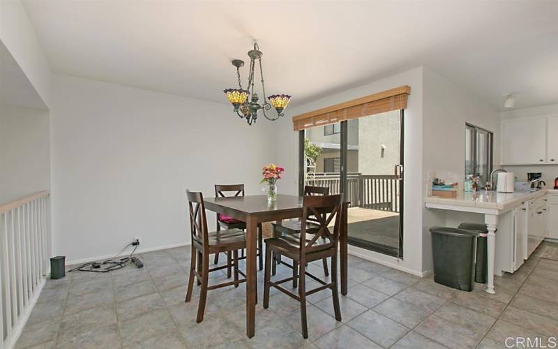 Dining area leads to one of three outdoor spaces