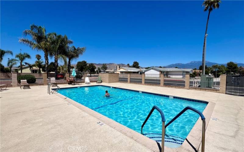 Community pool, shaded sitting area (not photoed).