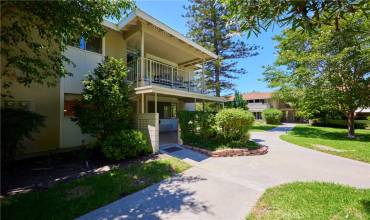 This super cute home is in a coveted location, surrounded by flowers, trees and green belts