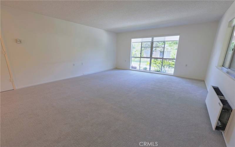 Oversize living room with fabulous floor to ceiling window