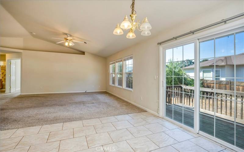 Dining area looking into living room, slider to the right