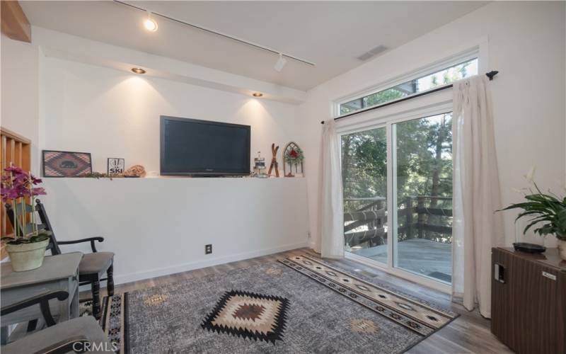 Bottom level bedroom with private deck