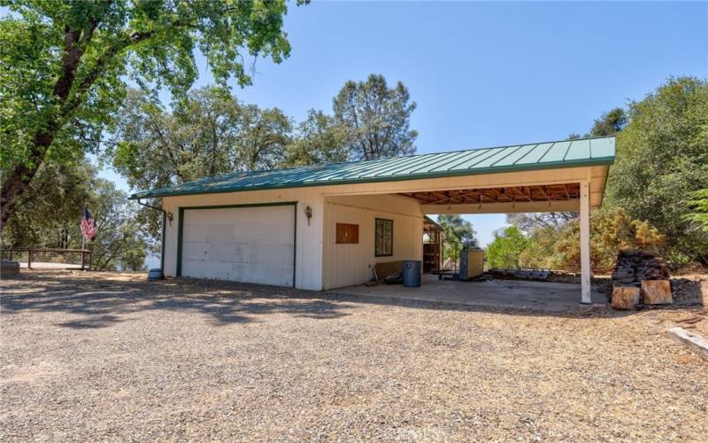 2 car garage with attached 2 car carport