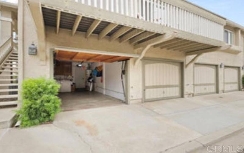 1-Car Garage leading into the downstairs unit