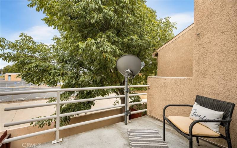 Balcony with view to playground and fields at school.