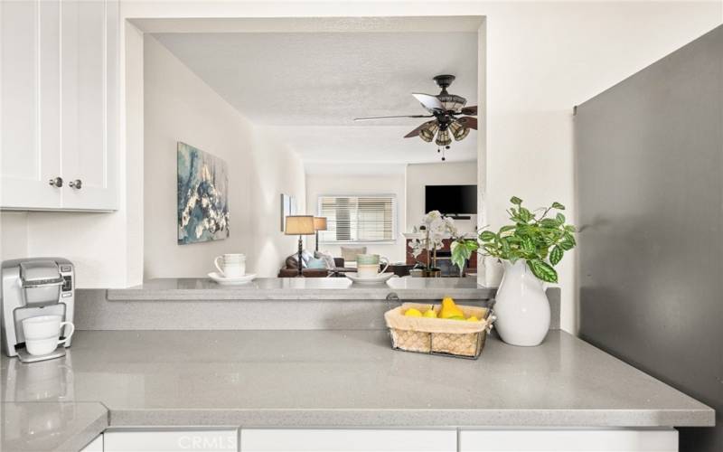 Cut out from kitchen allows great view into the other living areas.