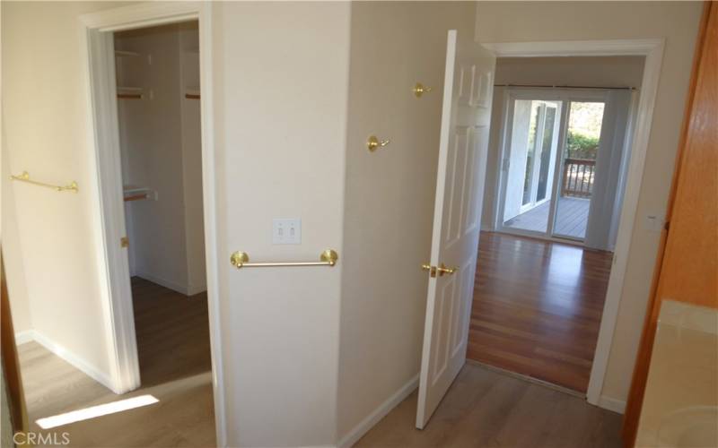 Large walk-in closet access from primary bathroom