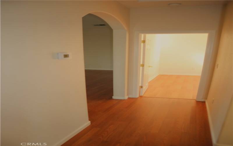 Main hallway with access to 2 bedrooms and guest bathroom