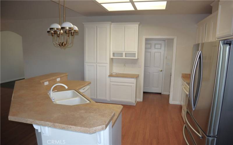 Kitchen island with sink and cabinets