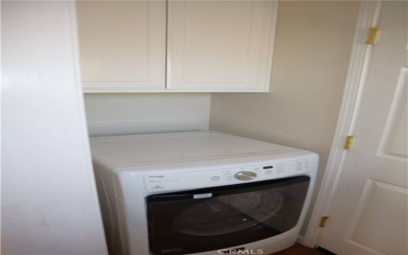 Laundry off kitchen, entrance to attached garage