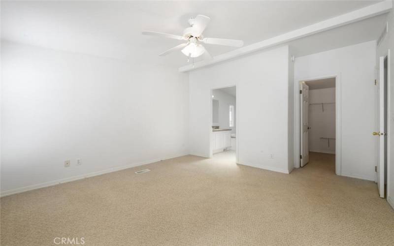 Master bedroom with walk in closet.