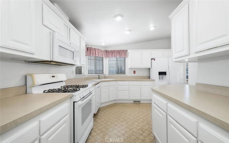 spacious kitchen with plenty of countertop space.