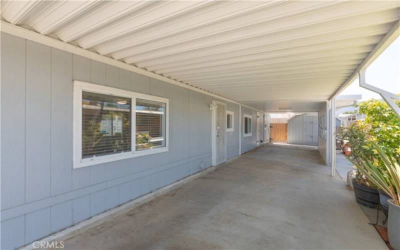 Spacious driveway with ample room for multiple vehicles.