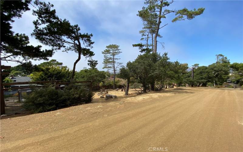 Property on left, 75' frontage after the neighboring fence.