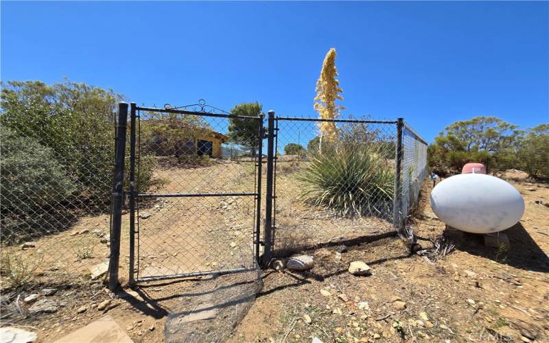 cross fenced gate to residential parcel