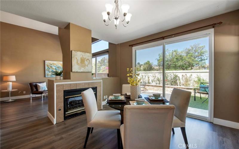 Dining Room with Fireplace. View to Living Room.