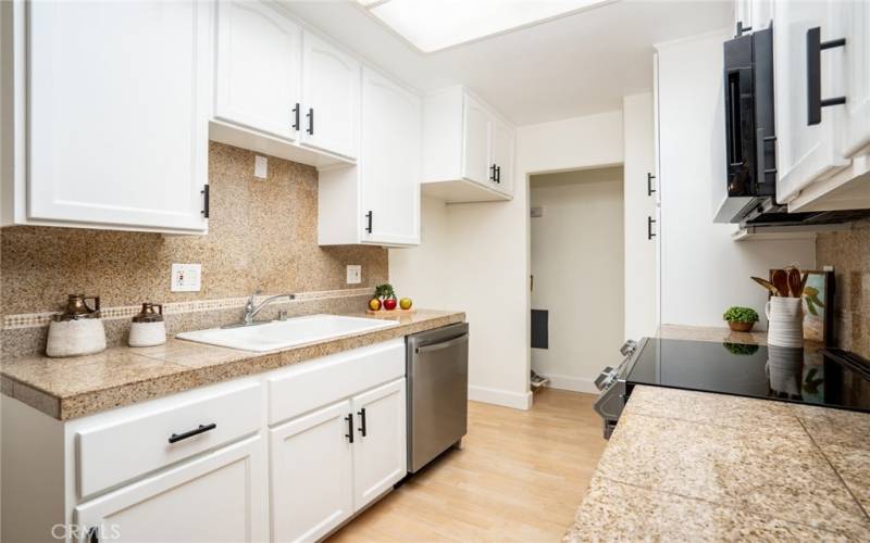 Beautiful granite tile counters and great pantry area!