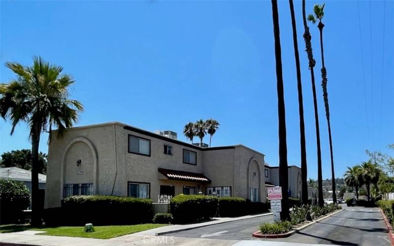 This smaller sized complex is tucked off of Chambers Street. And the unit itself is toward the back of the complex. Close to it's dedicated parking spot and steps from the pool.